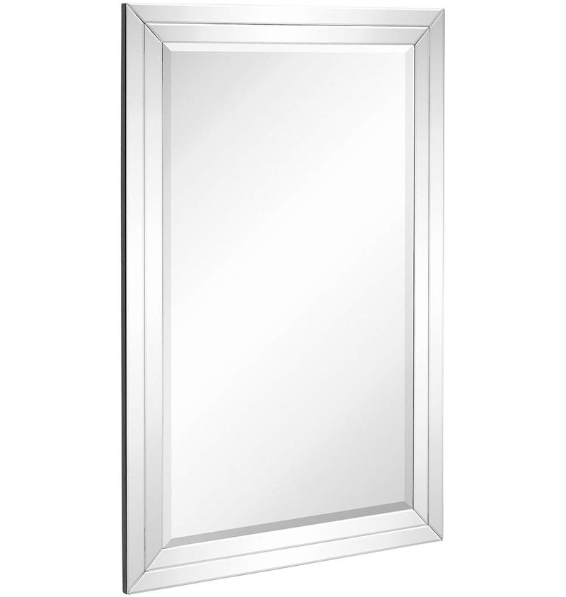 Large wall mirror with a flat frame and a bevelled mirror frame with a double mirror edge