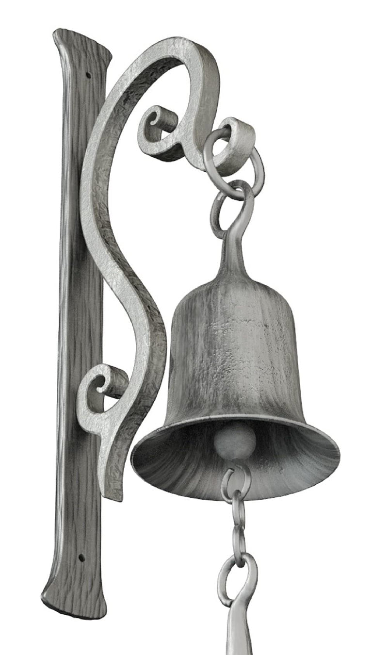 Table Bell 675 inches, cast iron design, shown on an antique vintage rustic