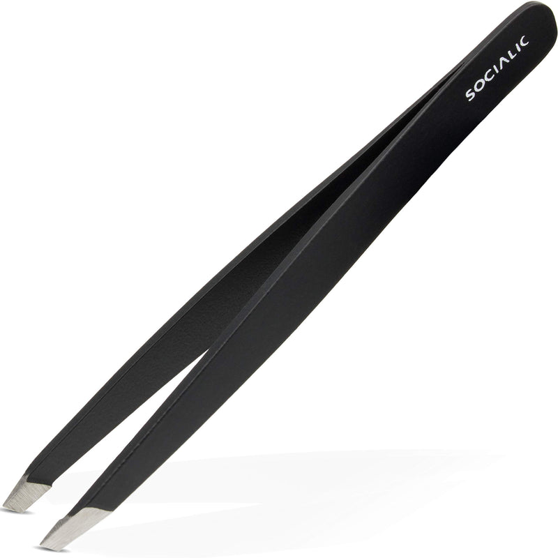 Eyebrow tweezers including eyebrow brush and case. Precise plucking tweezers