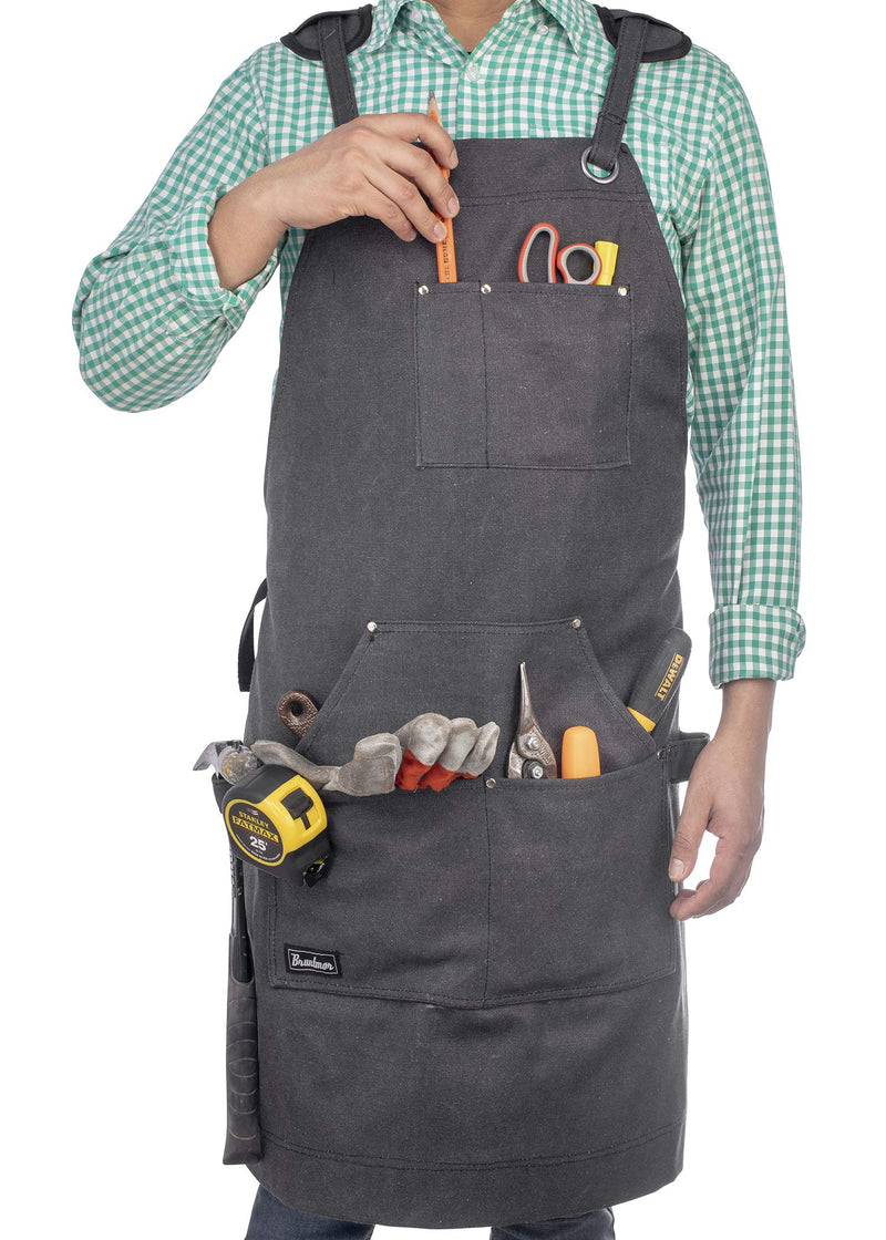 Durable waxed canvas work apron with pockets and crossed straps at the back - perfect