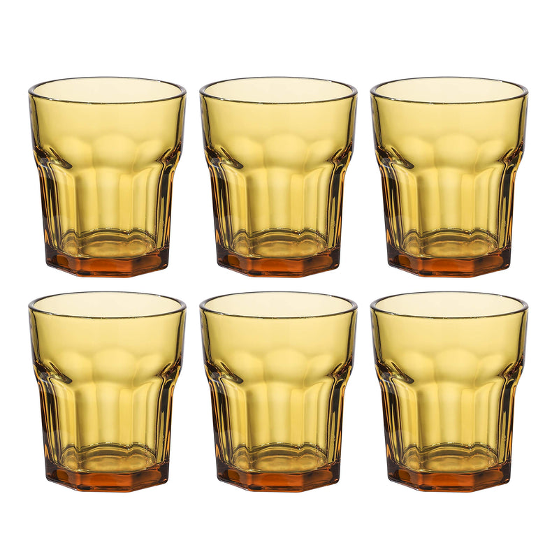 Double old-fashioned glasses, drink glass, colored cups and water